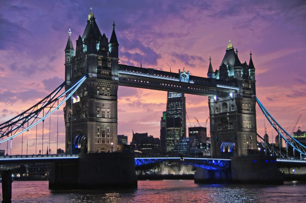 Iconic Tower Bridge in London against a stunning sunset sky. Perfect for travel and architecture themes.