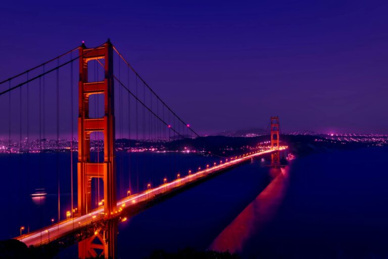 Stunning view of the Golden Gate Bridge lit up under a night sky, San Francisco.